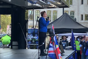 IMAGE: Terry Reintke MEP speaking to crowds in Parliament Square, Westminster.